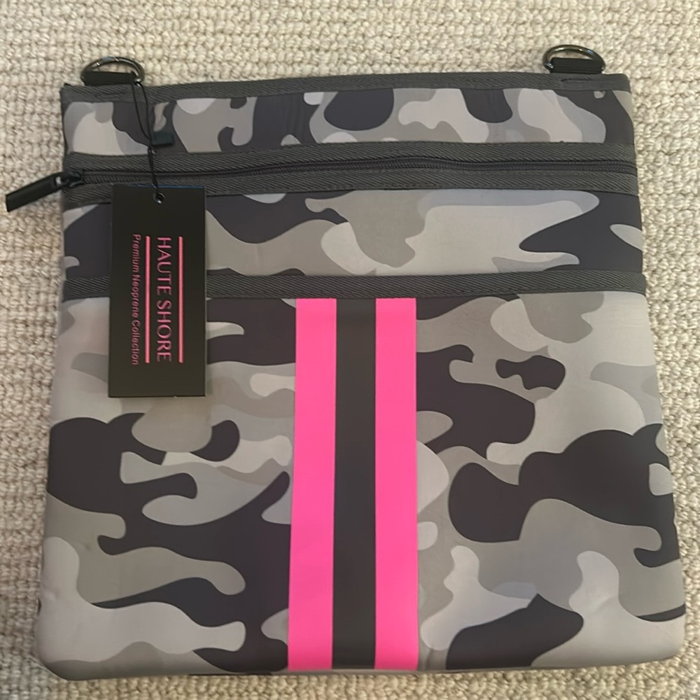 Haute shore camo bag new never used with multiple choices of shoulder straps.